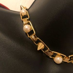 Gold pearl and spike choker necklace